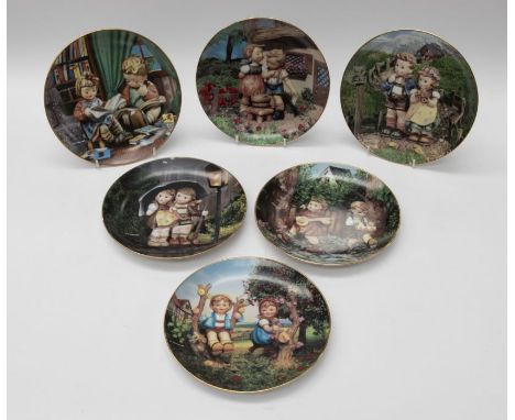 A collection of twelve boxed Danbury Mint Hummel Collectors plates&nbsp;