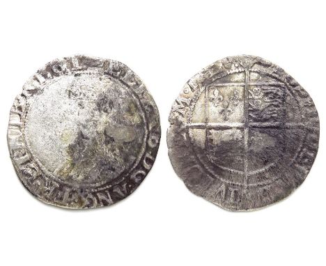 Elizabeth I shilling.  Sixth issue, 1582-1600 AD. Silver, 30mm, 5.3g. Crowned bust left, ELIZAB D G ANG FR ET HIB REGI. R. Sh