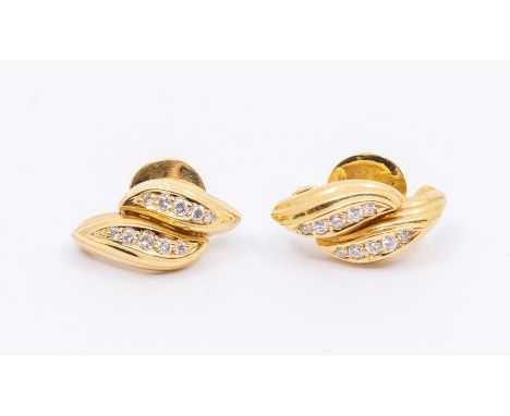 A pair of diamond and 18k set earrings, comprising a double leaf design, each claw set with a row of ten graduated round bril