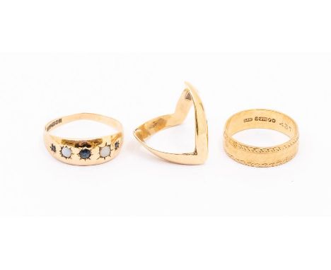 Three 9ct gold rings to include an opal and sapphire three stone ring, size U, (misshaped) a wedding band, with engraved deta