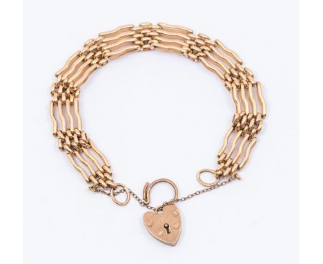 A 9ct rose gold gate bracelet. four bar, length approx 7'', padlock clasp, weight approx 21gmsFurther details: good, all link