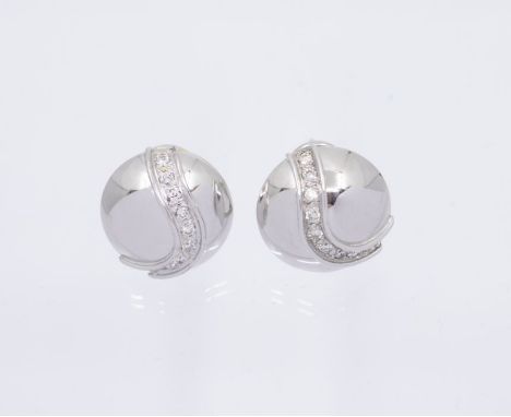 A pair of diamond and 18ct white gold earrings, comprising a dome with an applied diagonal row of graduated round brilliant c