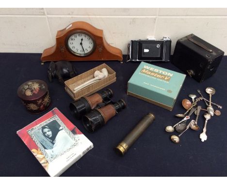 A collectors lot containing vintage cameras including Zeiss, Ikon, Brownie, 19th Century telescope and binoculars, mantle clo