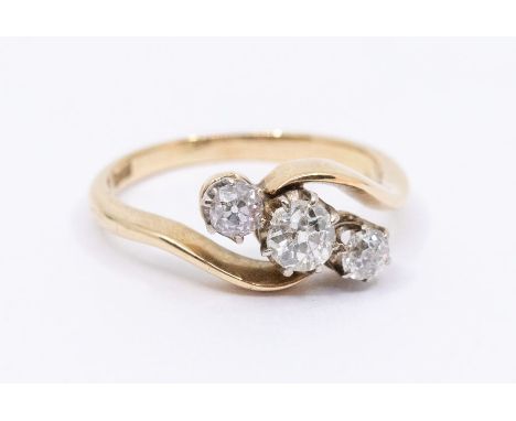 A three stone diamond and 18ct gold ring, comprising three graduated old cut diamonds, total diamond weight approx 0.45ct cla