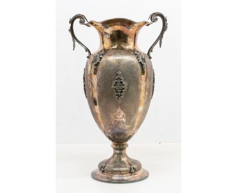 An Italian 800 standard silver and gilt urn shaped two handled vase, wavy rim above body with applied decoration and engraved