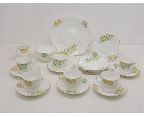 Bell china, including six cups and saucers, six side plates, one sandwich plate, one sugar basin, one small jugone cup cracke