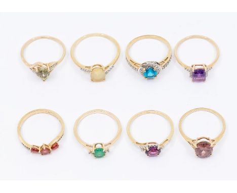 A collection of 9ct gold and gem set rings to include amethyst, pink zircon, ruby, topaz, neo apatite, amethyst, opal ring, e