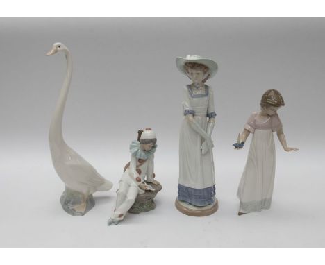 Four Nao figures of two young ladies a clown boy and swan