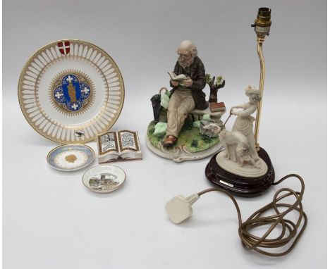 A small group of ceramics to include Capodimonte figure of a gent sat on a bench reading, Spode limited edition Salisbury Cat