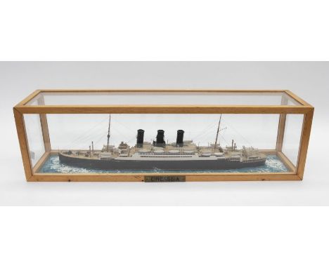 An early 20th Century wooden model of the Ocean Liner CIRCASSIA (launched in 1937) within glass frame, (some damage to paintw