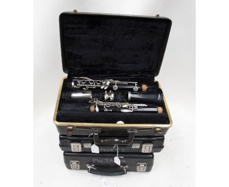 EX SCHOOL -&nbsp;A Bundy clarinet, mouthpiece missing, another by Bundy, another by Buescher also lacking mouthpiece section 