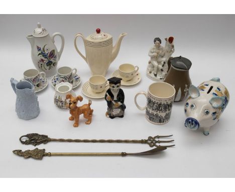 A collection of 19th and early 20th Century ceramics, figures in stone ware, jugs, jelly moulds, mugs, other collectable cera