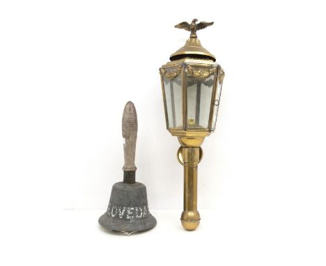 A Victorian gilt metal wall light in the form of a Carriage lamp, surmounted by a flying Eagle, 23" long together with a 19th