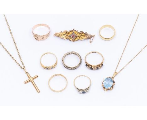 A collection of gold jewellery to include two 18ct gold bands, weight approx 5.7gms, a 9ct gold cross on a yellow metal chain