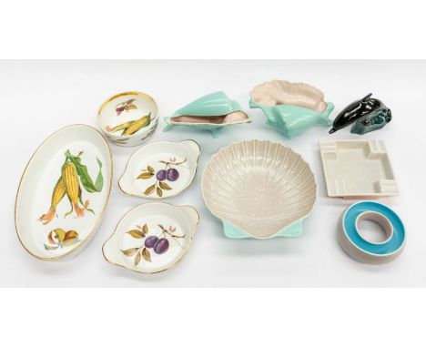 A collection of mid 20th Century Poole Pottery including ashtray, dish, dolphin, along with Worcester Evesham dinner wares