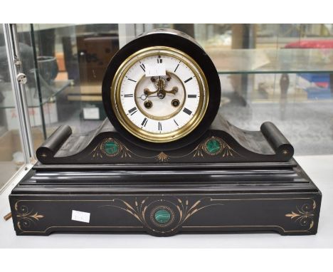 A Victorian slate mantel clock, a two-train skeletonised, jewelled escapement. French movement. Serial numbers on backplate 1