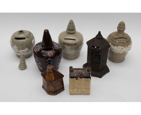 A collection of seven 19th &amp; 20th Century ceramic money boxes, some with names and dates and Barge ware box