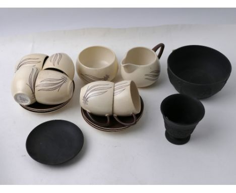 Carltonware handpainted part tea set and three pieces of black Wedgwood Jasperware 