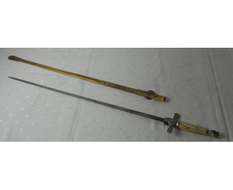 A dress sword with bone handle and engraved scabbard