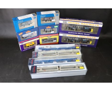 12 Boxed OO gauge items of rolling stock to include Bachmann x 2, Electrotren x 4, Dapol x 5 and Oxford x 1