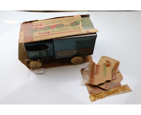 Triang tinplate Clockwork Steam Van 203/1 in light blue with white wheels, with box which is very poor and in parts