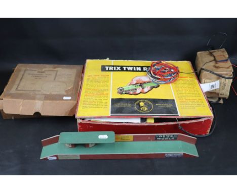 Collection of TTR Twin Trix Railway to include two locomotives and 9 items of rolling stock featuring ESSO tanker, track, bui