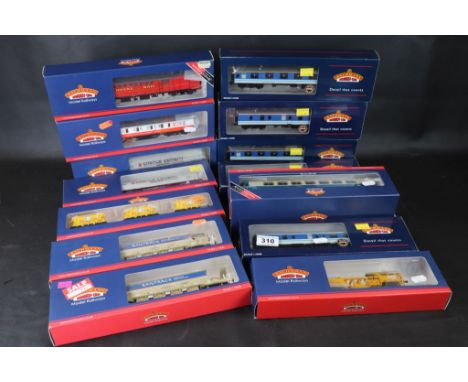 13 Boxed Bachmann O gauge items of rolling stock to include 39001Z Twin Pack, 39420W TPO Sort Van Royal Mail Red exclusive fo