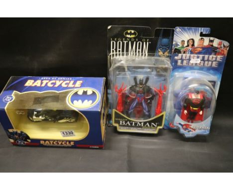 Boxed Corgi 2000 D C Comics Batman Bat Cycle 1:16 scale together with Kenner Legends of Batman Blister Pack Figure and Mattel