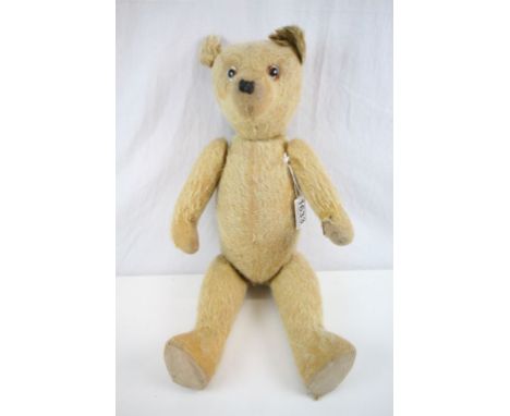 Vintage straw filled Teddy Bear with inactive growler & moving limbs and head approximately 16 inches tall