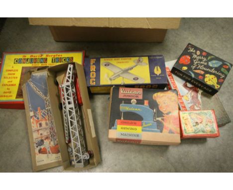 Group of toys and games to include boxed Chad Valley Give-a-Show Projector, boxed Vulcan Junior Childs Sewing Machine etc