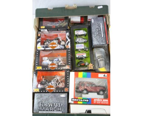 12 Boxed diecast models to include Britains 9480 Land Rover Discovery, Corgi Forward March x 2, Maisto Harley Davidson x 3 et