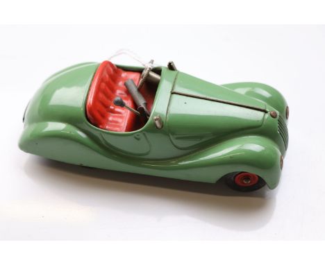 Original Schuco Examico 4001 clockwork tin plate vehicle in green with red seat, with key, gear stick and wheel in tact, vg