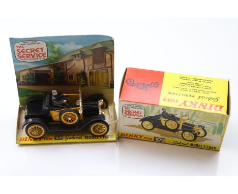Boxed Dinky 109 Gabriel Model T Ford in black with yellow, driver present, vg condition with vg inner display stand and gd bo