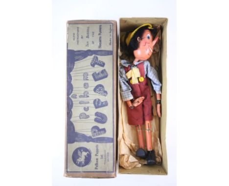 Early boxed Pelham Puppets Pinocchio puppet in good condition, box is for Macboozle