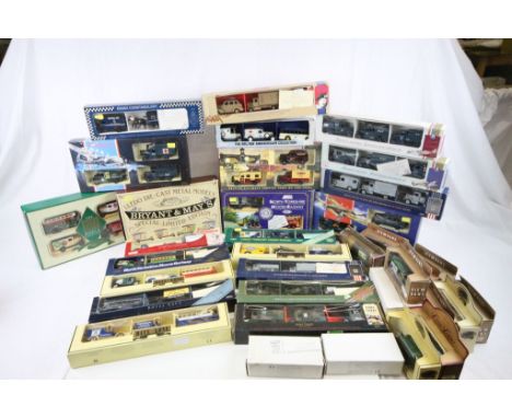 Eighteen Lledo Boxed Three Van Sets including 3 x Days Gone, Home Front, Essex Police, Royal Navy, Pearl Harbour, British Arm