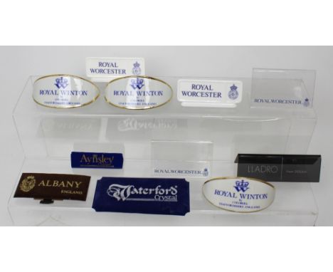 A collection of display plaques for ceramic factories to include three ceramic Royal Winton examples, two ceramic and two cle