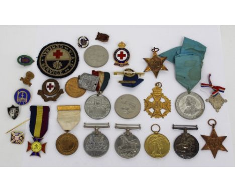 A group of medals to include WWI War and Victory pair awarded to M-344779 Pte. J.E. Gatrell, A.S.C., WWII War and Defence Med