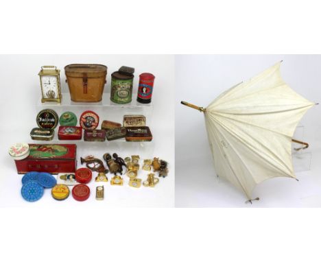 A collection of tins to include Huntley & Palmer, CWS and other examples, also a personal carriage clock etc.