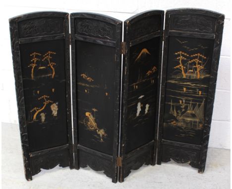 A Japanese four-panel folding fire screen with carved and painted decoration, width when extended approx 107.5cm.