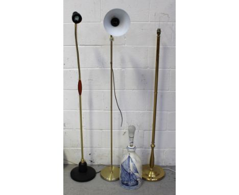 A standard lamp, two modern floor-standing metal lamps, the tallest approx 160cm and a ceramic blue and white Delft-style tab