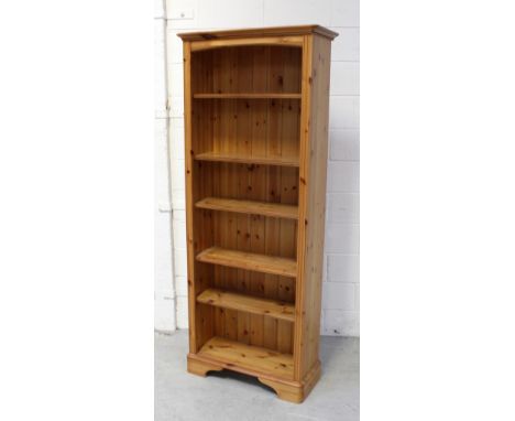 A modern pine five-shelf bookcase, approx 188 x 75cm.