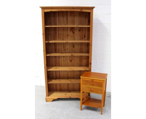 A modern pine five-shelf bookcase, 188 x 98cm and a side table (2).