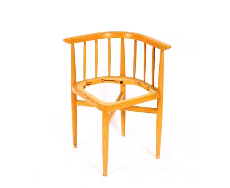 A set of four Ercol style stick back corner dining chairs