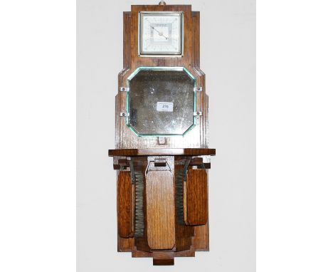 An oak Art Deco wall mounted barometer, mirror and brush set, 64cm high