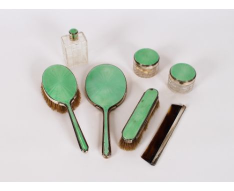A seven piece silver and enamel Art Deco dressing table set, London 1936