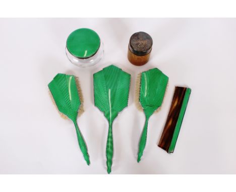 A silver plated and green enamel decorated Art Deco design dressing table set; and a Danish Sterling mounted wooden cigarette