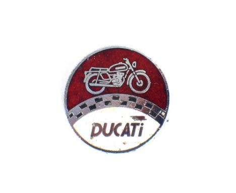 A Ducati enamel motorcycle badge