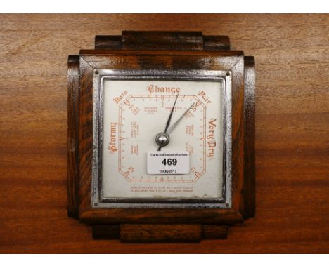 An oak Art Deco barometer