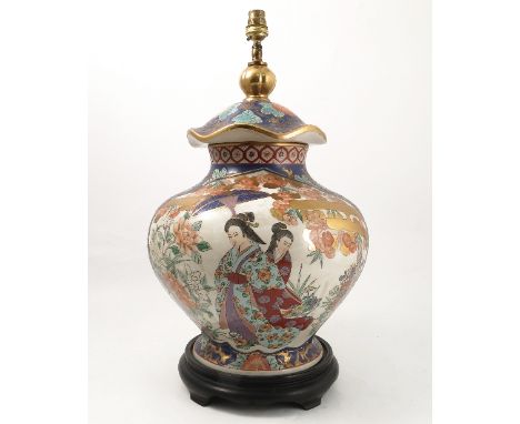 A bulbous bodied covered vase, in the Imari style, converted to a lamp base, height 22ins   