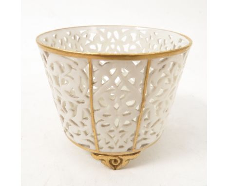 A Graingers Worcester pierced gilded ivory beaker, raised on three gilt feet, height 2.25ins 